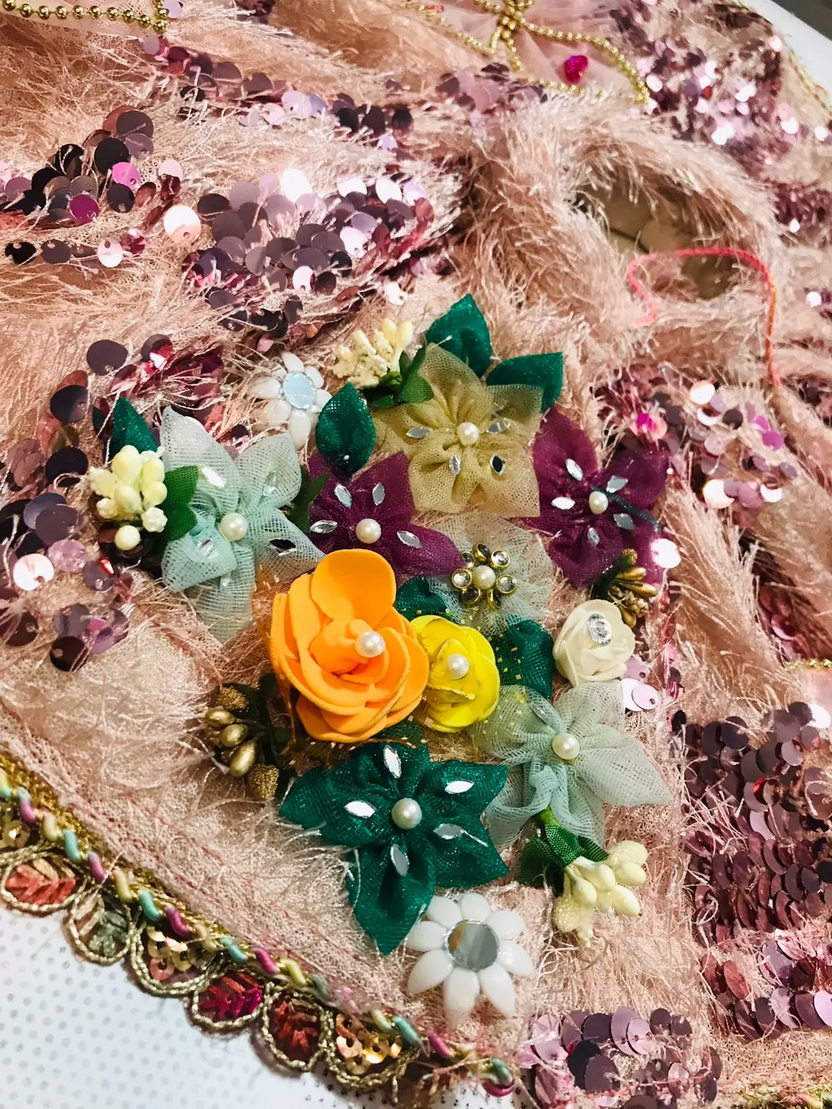 Poshak for big size 20 inch laddu gopal. Designed with handmade and vibrant coloured flowers.